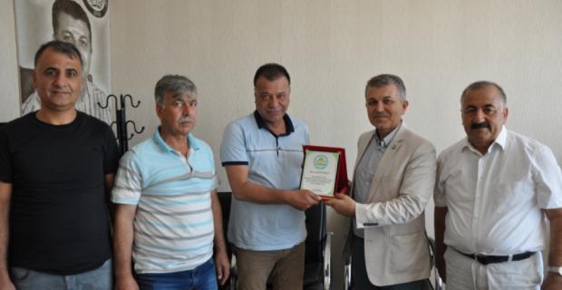 MTDF'den Tayın Olan Saruhan'a Plaketli Teşekkür