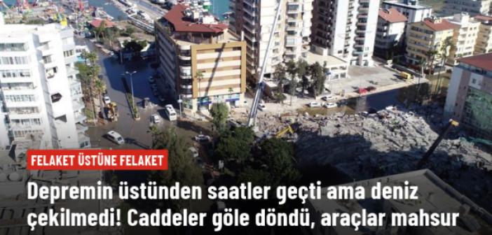 Deniz seviyesinin yükseldiği DEPREM BÖLGESNDE caddeler göle döndü, işyerleri boşaltıldı, araçlar mahsur