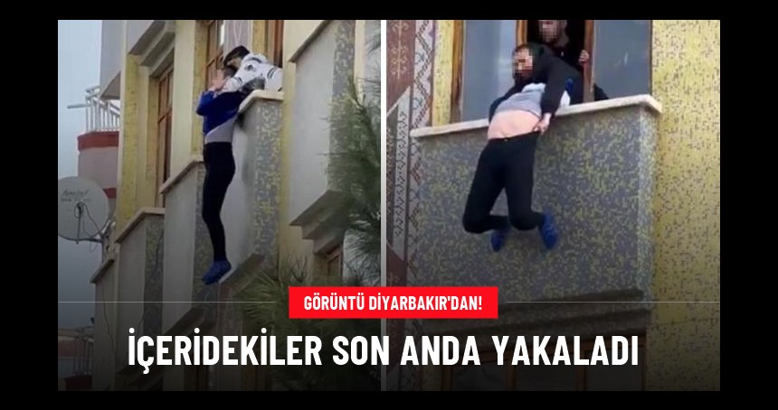 Apartmandan aşağı atlayan kadını son anda yakaladılar