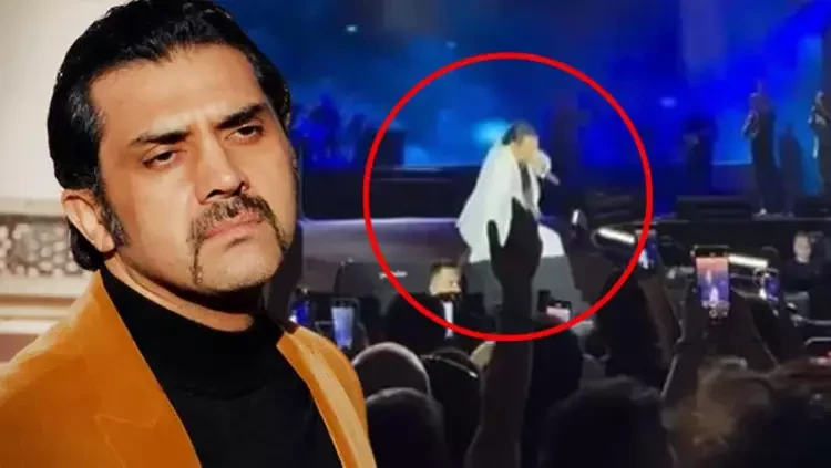 Konserde talihsiz olay! Ünlü şarkıcı yere düştü
